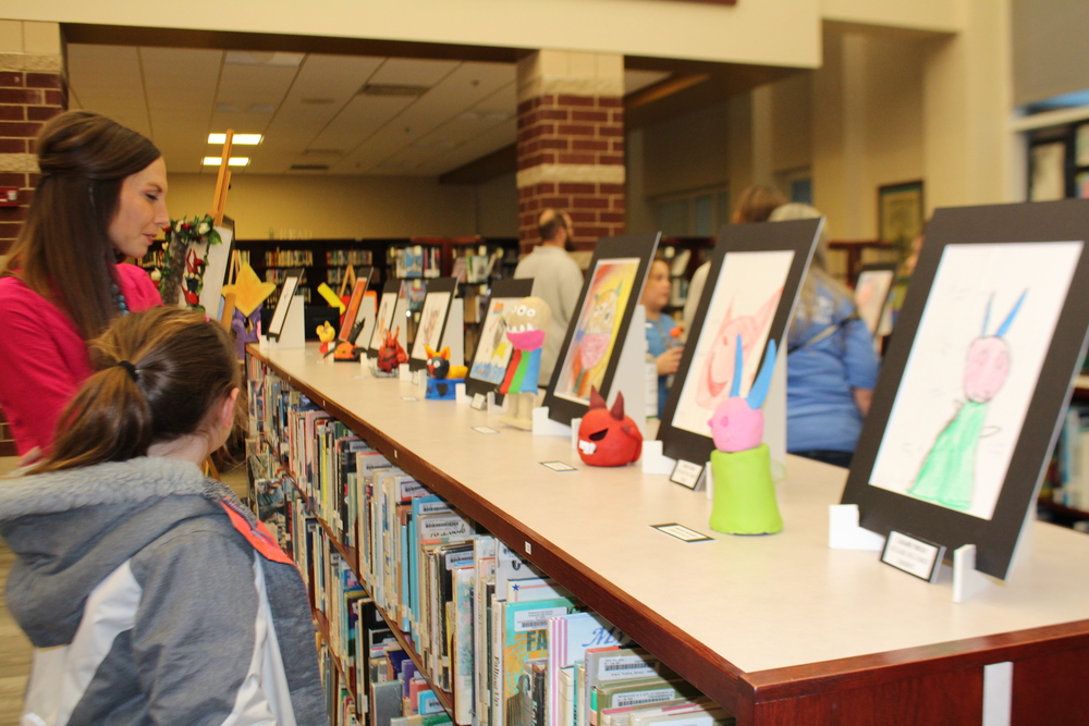 Portsmouth art students present gallery to school board