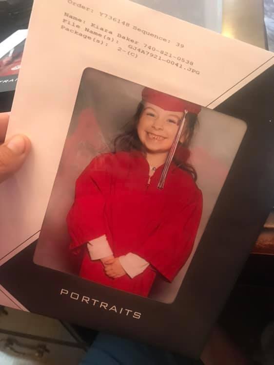 Portrait of Student Posing in Kindergarten Graduation Cap and Gown